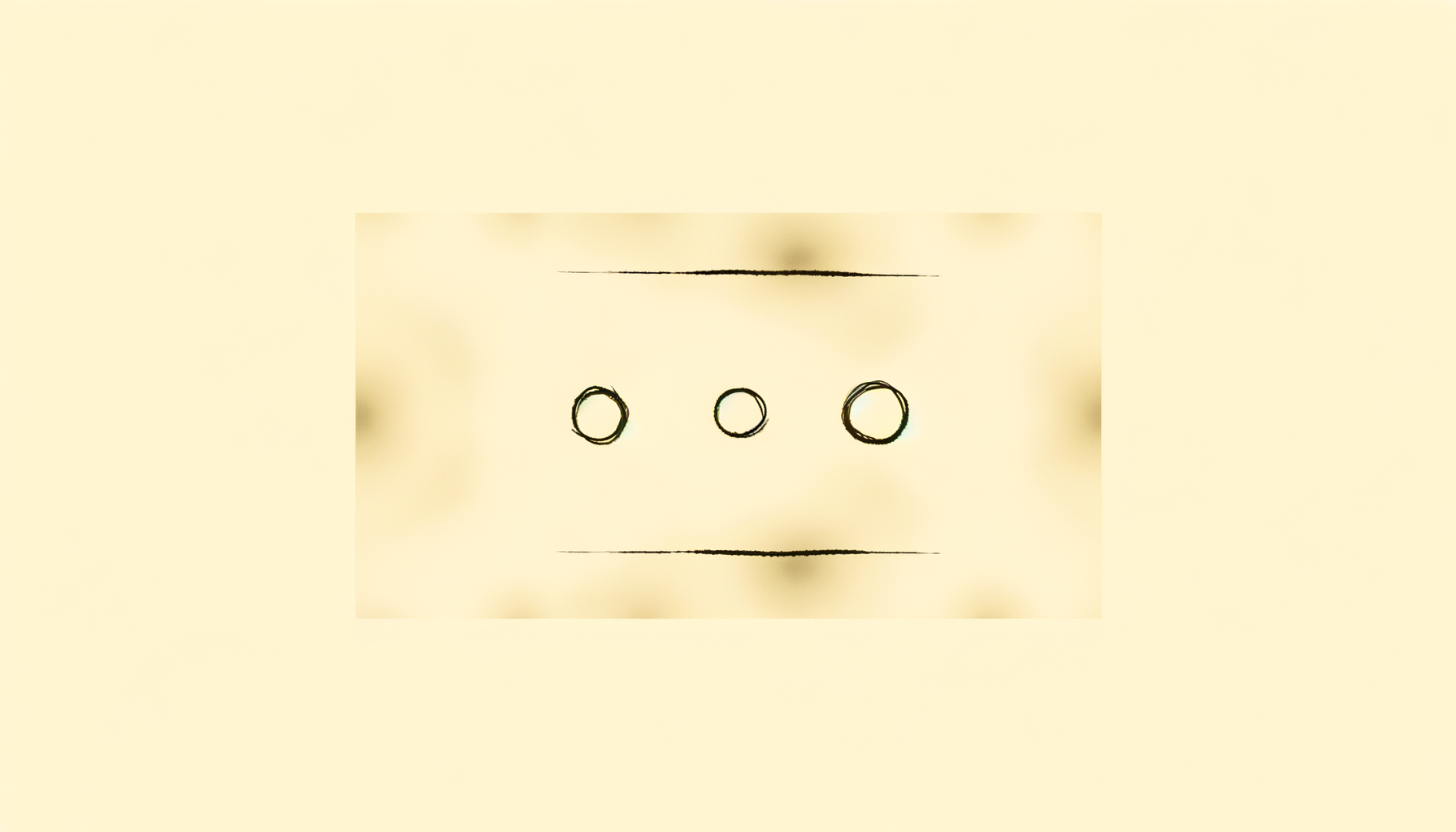 שלוש נקודות דיו מחוברות בקו אופקי דק.